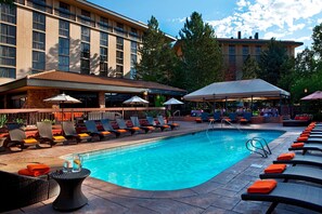 Indoor pool, seasonal outdoor pool, pool umbrellas, pool loungers