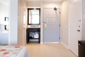 Separate tub and shower, towels, soap, shampoo