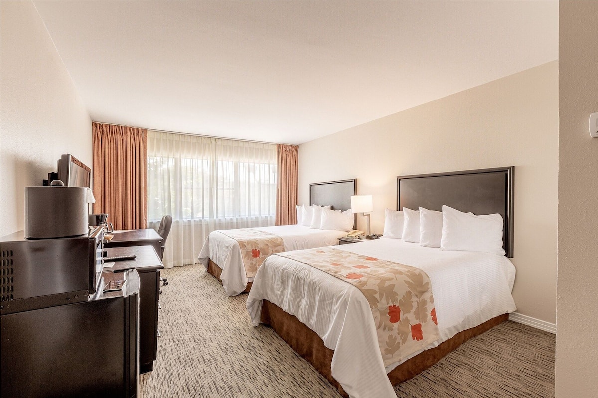 Premium bedding, pillowtop beds, desk, laptop workspace