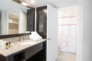 Separate bathtub and shower, towels, soap, shampoo - Value Suites Extended Stay - Arlington (Arlington)