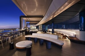 4 bars/lounges, rooftop bar, lobby lounge, pub