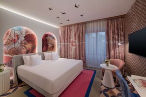 Roba de llit d'alta qualitat, minibar i caixa forta a l'habitació 
