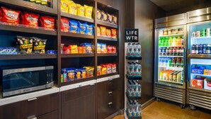 A snack and beverage section with various brands and products. - Courtyard by Marriott Columbus Worthington (Columbus)