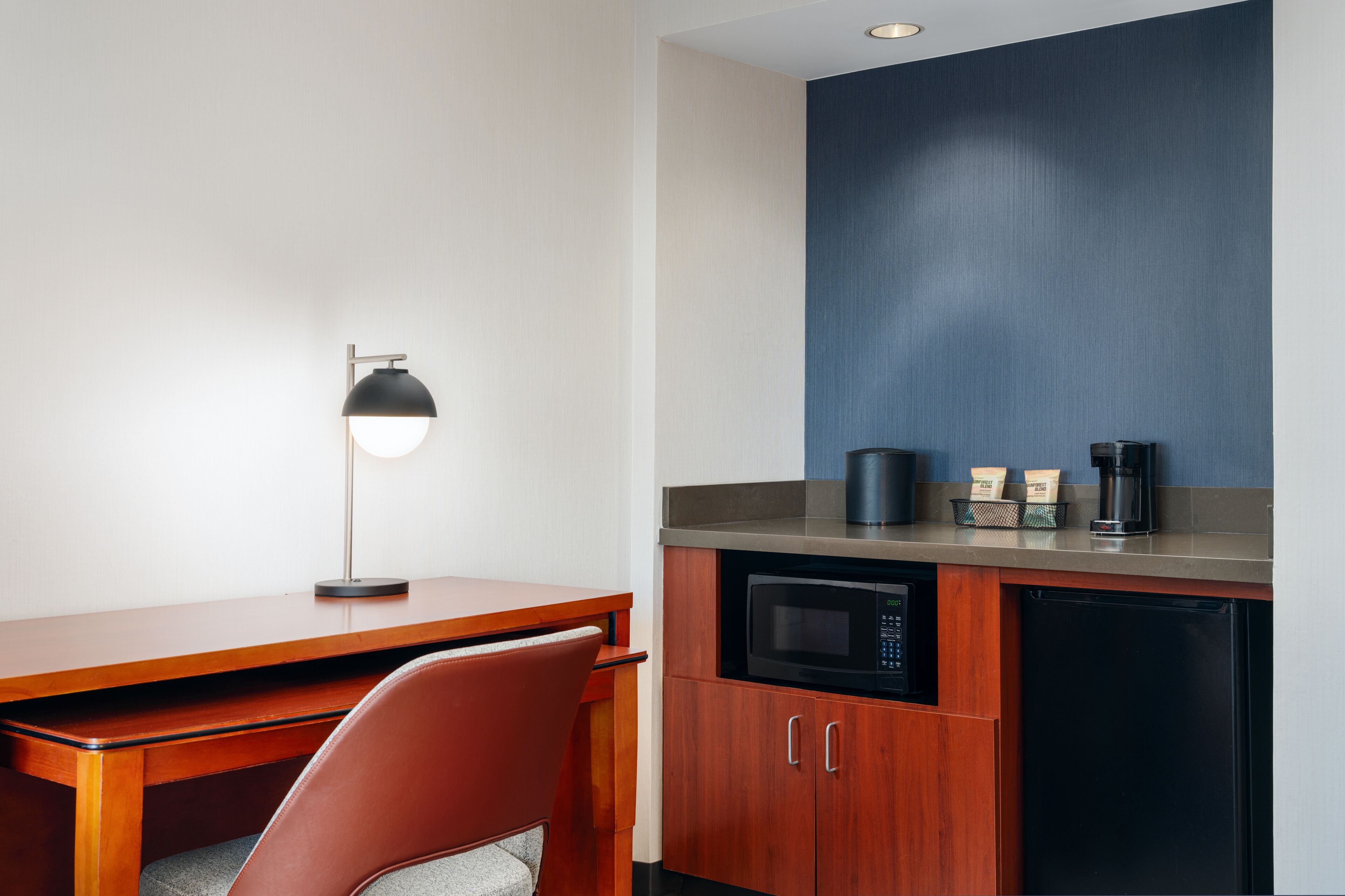 premium bedding, desk, laptop workspace, blackout curtains