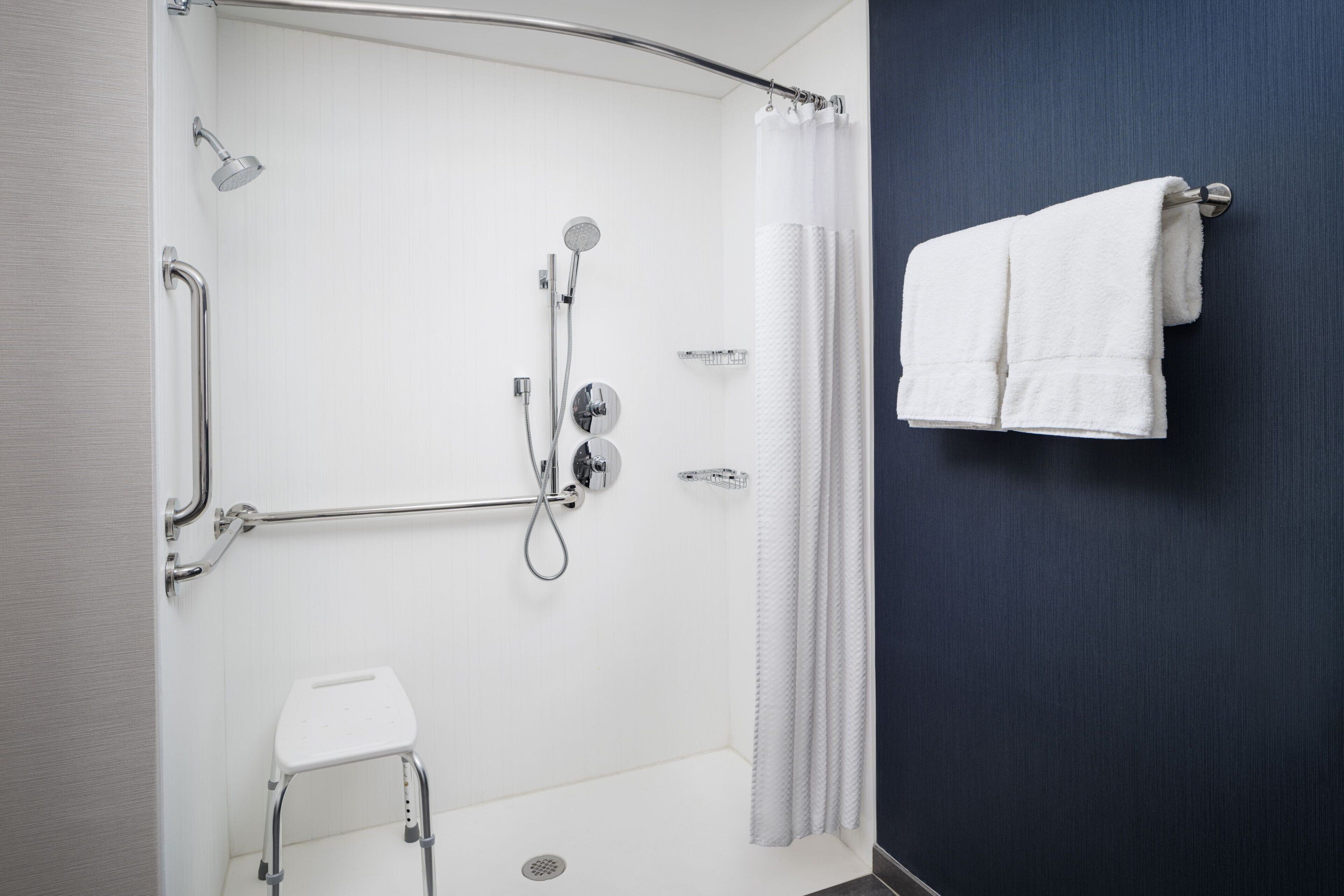 room, 2 double beds (mobility/hearing access, roll-in shwr) | bathroom | combined shower/bathtub, free toiletries, hair dryer, towels