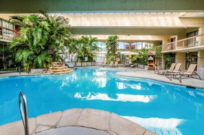 Indoor pool, open 9 AM to 9:00 PM, pool umbrellas, sun loungers