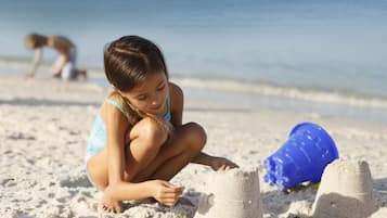 Beach nearby, white sand, free beach shuttle, beach cabanas