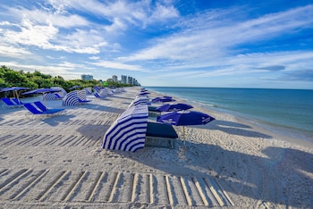 Beach nearby, white sand, free beach shuttle, beach cabanas at Naples Grande Beach Resort
