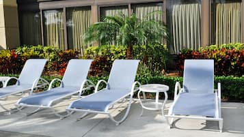 Outdoor pool, open 7:00 AM to 6:00 PM, pool umbrellas, sun loungers