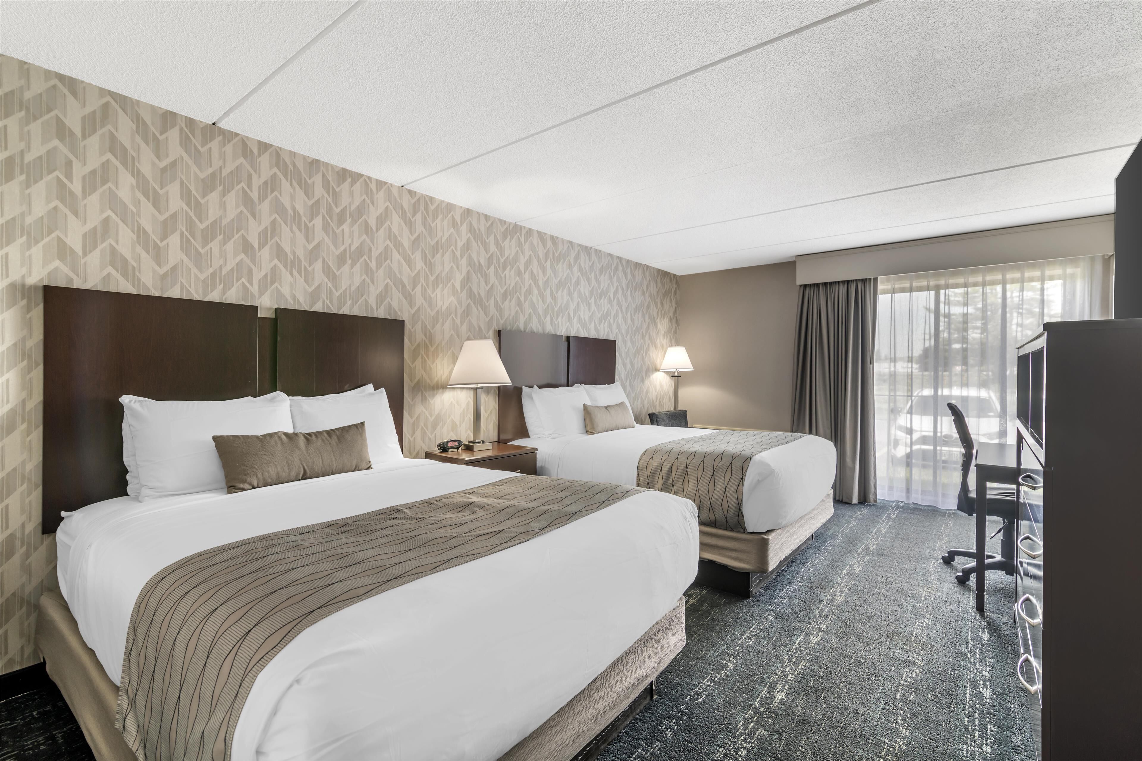 standard room, 2 queen beds, non smoking, refrigerator & microwave | premium bedding, individually decorated, individually furnished, desk