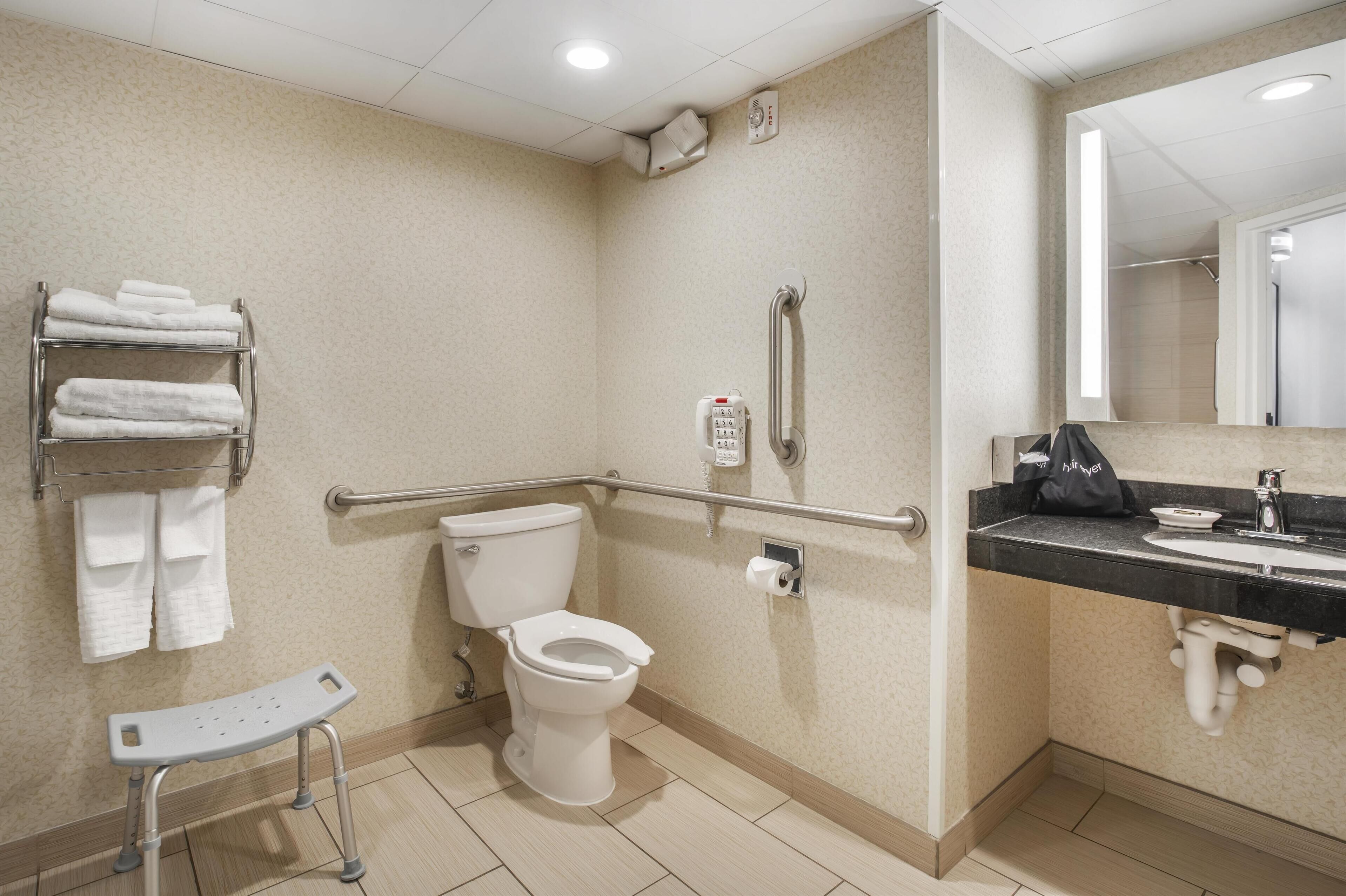 combined shower/bathtub, free toiletries, hair dryer, towels