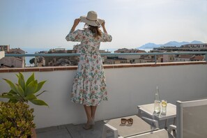 Luxury Suite, Terrace, Sea View | Premium bedding, free minibar items, in-room safe