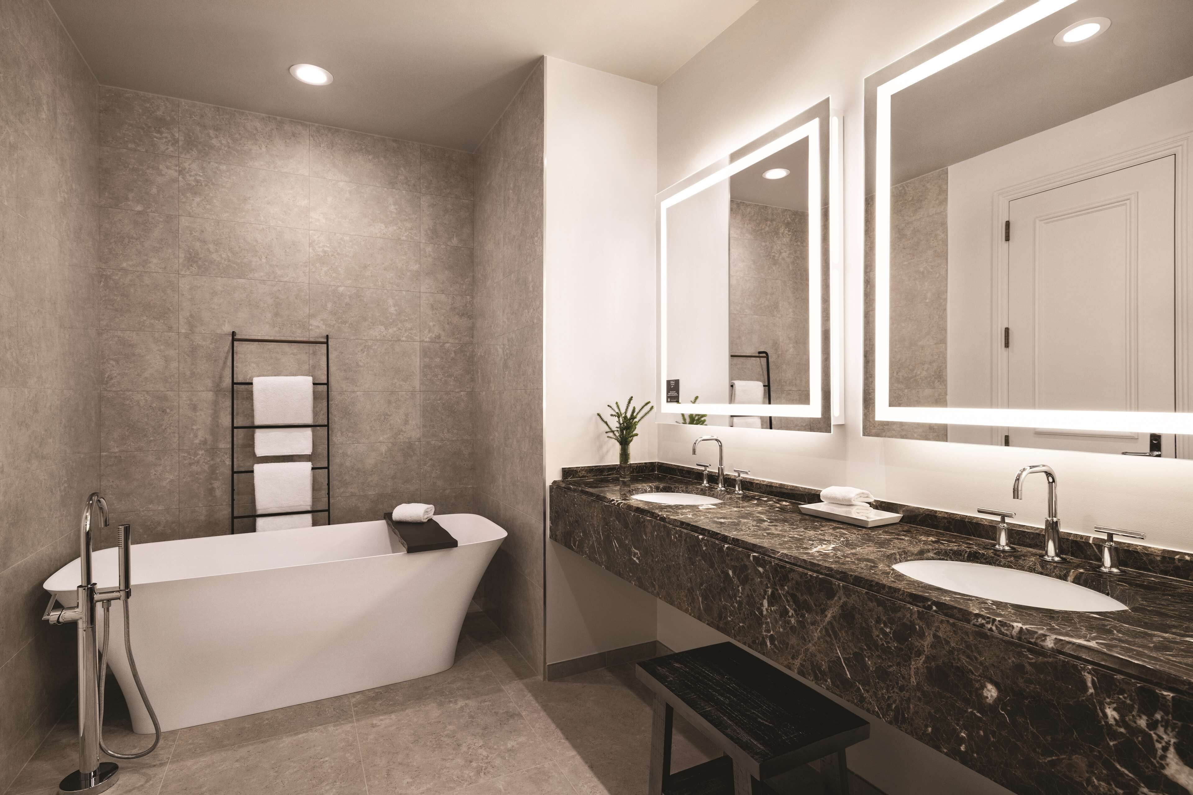 designer toiletries, hair dryer, towels