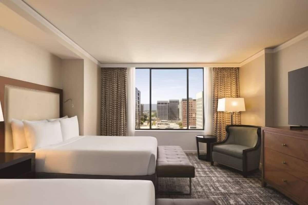 Premium bedding, down comforters, in-room safe, desk