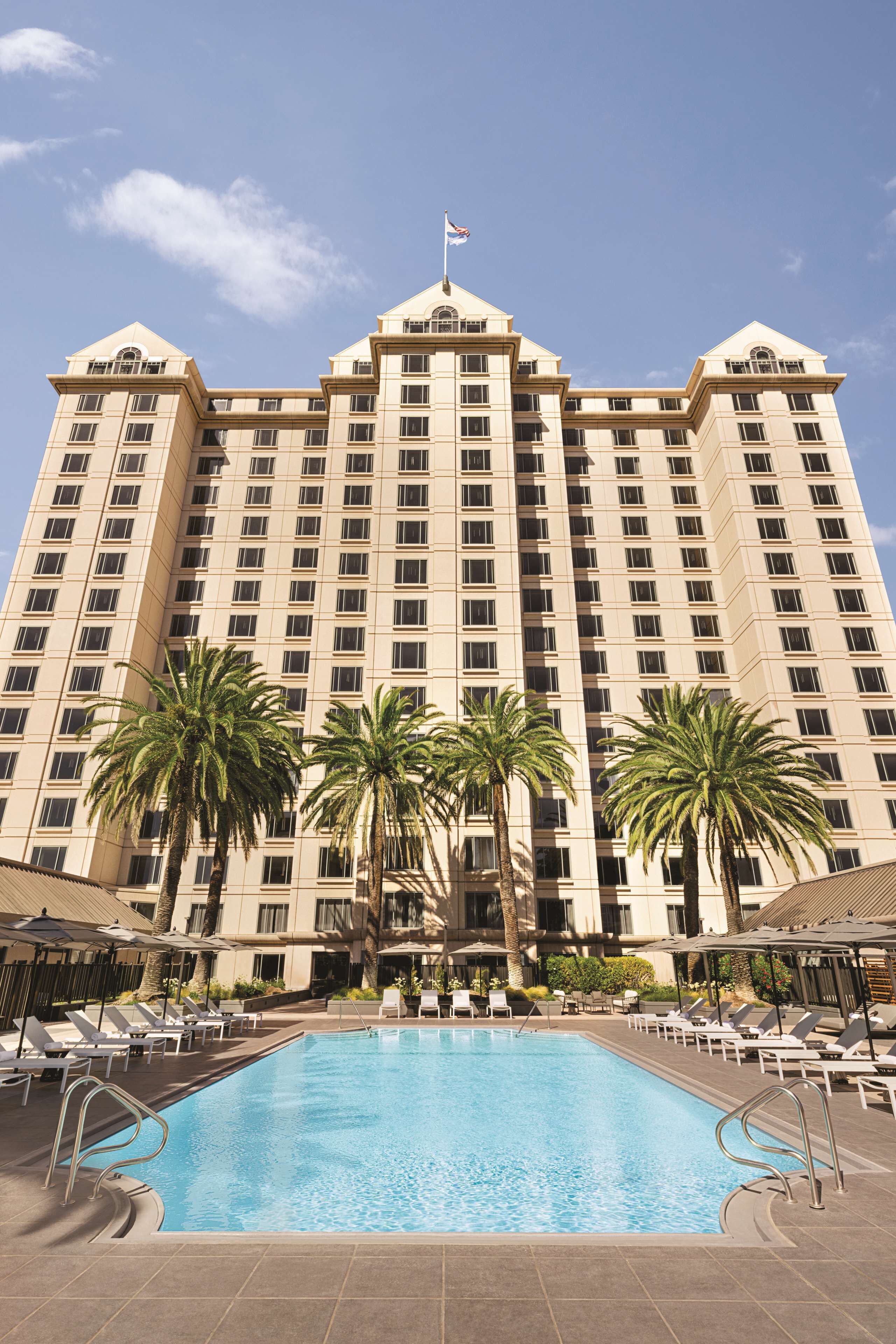 Outdoor pool, open 8:00 AM to 7:00 PM, pool umbrellas, pool loungers