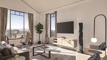 A modern living room with a sofa, coffee table, and a desk with a chair. There is a large window with curtains, a potted plant, and a flat-screen TV mounted on the wall.