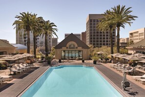 Outdoor pool, open 8:00 AM to 7:00 PM, pool umbrellas, pool loungers