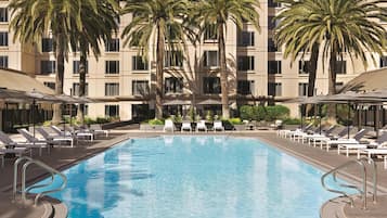 Outdoor pool, open 8:00 AM to 7:00 PM, pool umbrellas, sun loungers