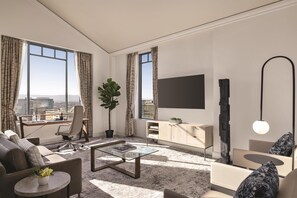 Presidential Suite | Living area | 58-inch flat-screen TV with cable channels, TV - Signia by Hilton San Jose (San Jose)