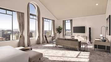 Suite, 1 Tempat Tidur King (Penthouse) | Area keluarga | Televisi layar datar 58-inci dengan saluran TV kabel dan TV