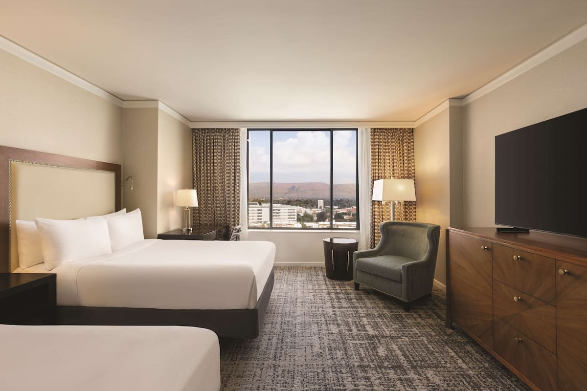 Premium bedding, down comforters, in-room safe, desk