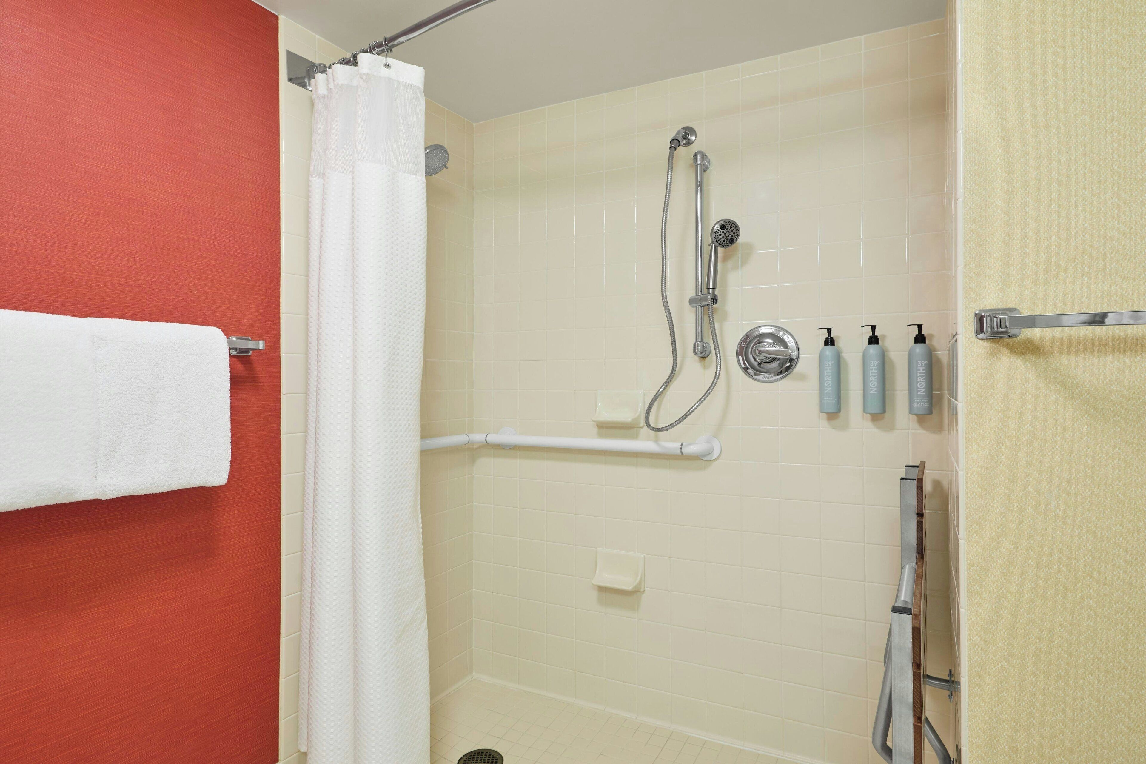 combined shower/bathtub, free toiletries, hair dryer, towels