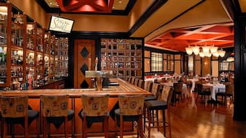 9 bars/lounges, 2 poolside bars