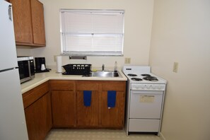 Deluxe Suite, 2 Queen Beds, Kitchen | Private kitchenette | Fridge, microwave, coffee/tea maker