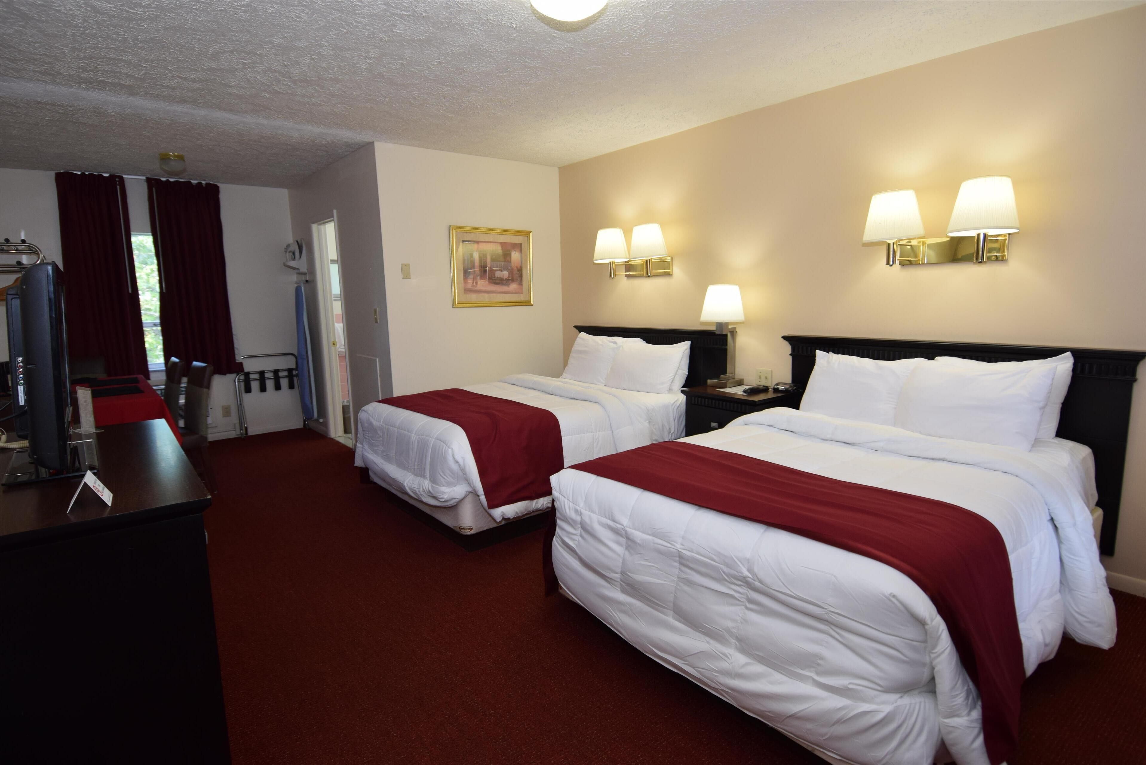 Pillowtop beds, individually furnished, desk, blackout drapes