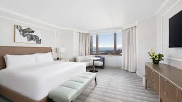 Premium bedding, down comforters, pillowtop beds, minibar