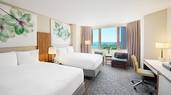 Premium bedding, down comforters, pillowtop beds, minibar at Fairmont Chicago at Millennium Park