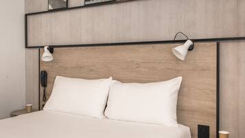 Premium bedding, desk, blackout curtains, soundproofing