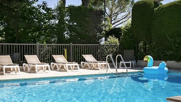 Outdoor pool, pool umbrellas, pool loungers