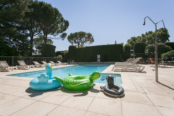 Outdoor pool, pool umbrellas, sun loungers