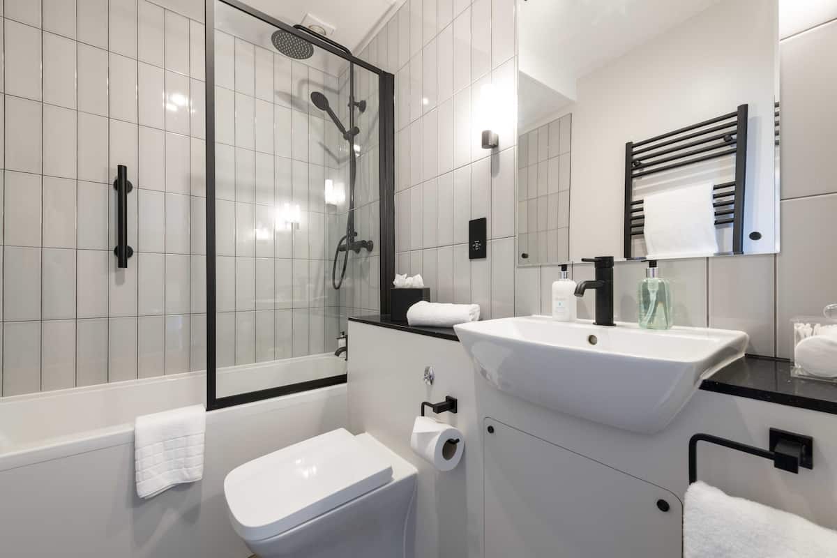 studio suite | bathroom | rainfall showerhead, free toiletries, hair dryer, towels