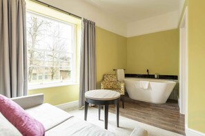 Suite, 1 King-Bett und Schlafsofa | Wohnbereich