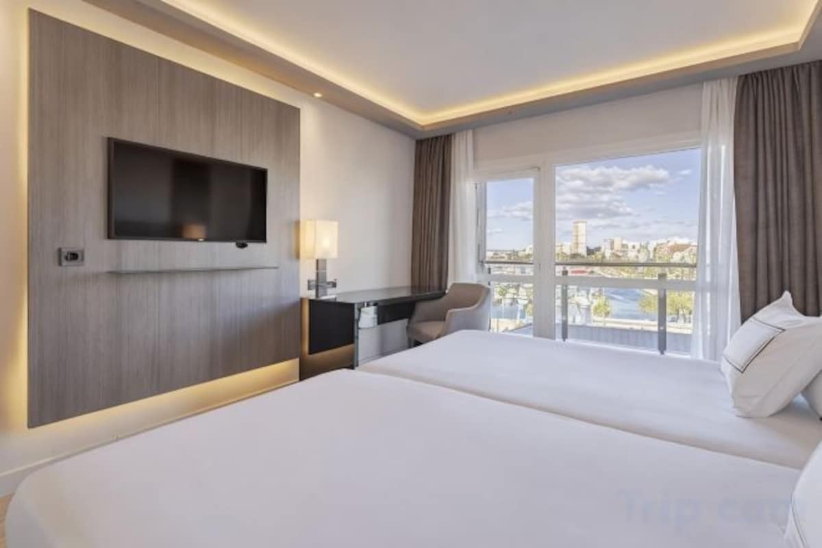 Ropa de cama de alta calidad y minibar 