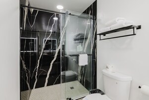 Shower, free toiletries, hair dryer, towels
