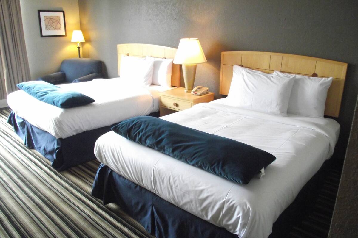 signature room, 2 queen beds, non smoking | 1 bedroom, desk, laptop workspace, blackout curtains