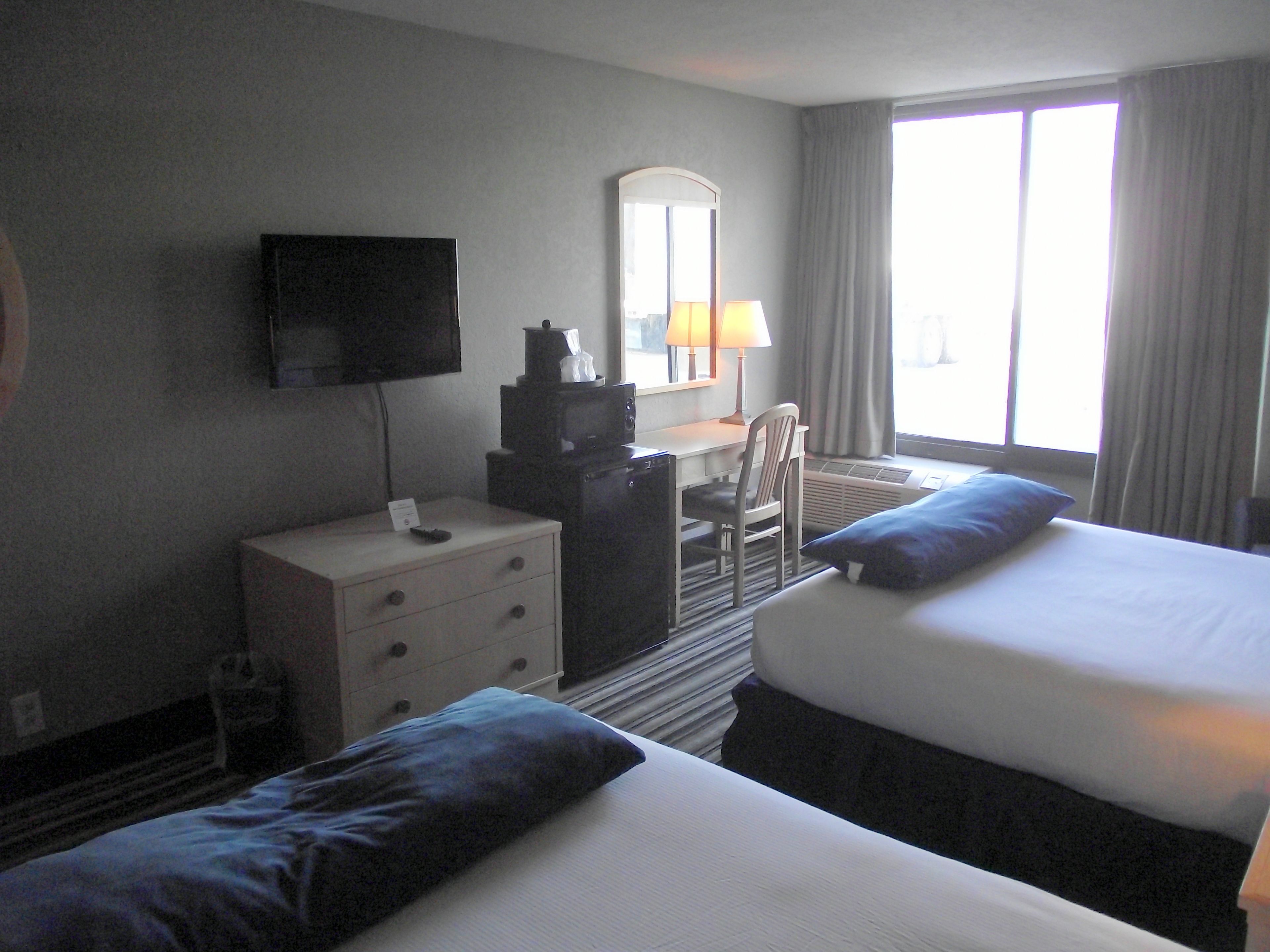 standard room, multiple beds, non smoking | 1 bedroom, desk, laptop workspace, blackout curtains