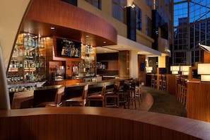 2 outdoor pools, open 6:00 AM to 10:00 PM, pool umbrellas, pool loungers
