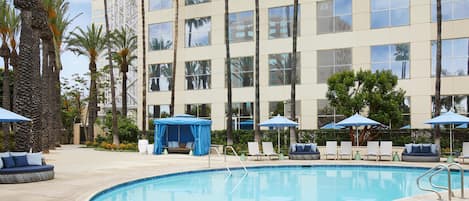 2 outdoor pools, open 6:00 AM to 10:00 PM, pool umbrellas, pool loungers