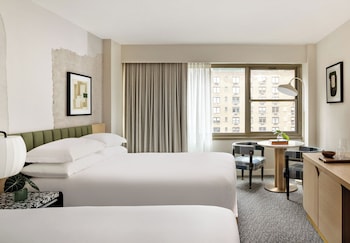 Premium bedding, in-room safe, laptop workspace, blackout drapes at Kimpton Theta New York - Times Square by IHG