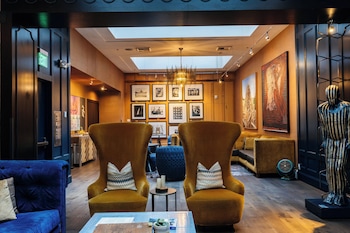 Sitting area in hotel lobby at Hotel Lucia