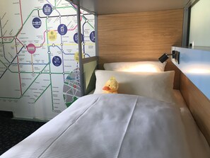 Premium bedding, desk, blackout drapes, soundproofing