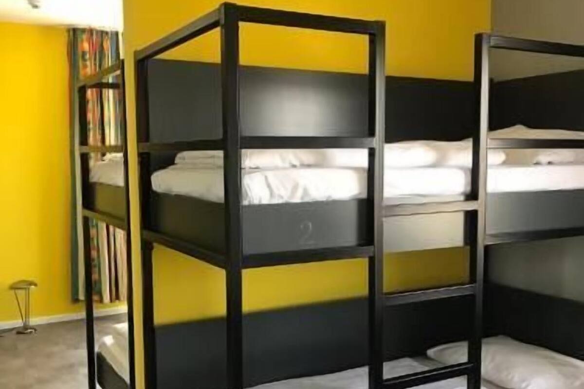 Premium bedding, desk, blackout drapes, soundproofing