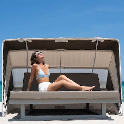 On the beach, sun loungers, beach yoga