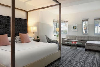 Suite, 1 Bedroom | Frette Italian sheets, premium bedding, minibar, in-room safe at Kimpton Surfcomber Hotel, an IHG Hotel