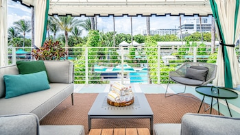 Outdoor pool, open 8:00 AM to 7:00 PM, cabanas (surcharge) at Kimpton Surfcomber Hotel, an IHG Hotel