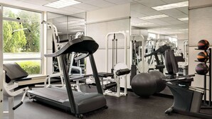 A gym with treadmills, weight machines, and exercise balls. - Days Inn by Wyndham Hershey (Hershey)